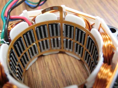 Figure 4, Mosolver internal construction: Integrating the resolver within the motor overcomes obstacles, in part by reusing the motor magnetic paths and the pulse width modulated (PWM) drive to provide excitation to the position sensing coils. Sine and co