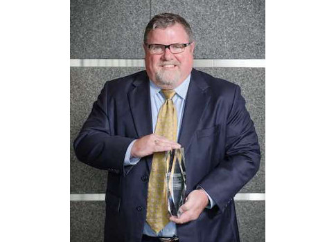 Representing the 2015 System Integrator of the Year in the large system integrator category is Paul Galeski, President and CEO of MAVERICK Technologies. Courtesy: CFE Media