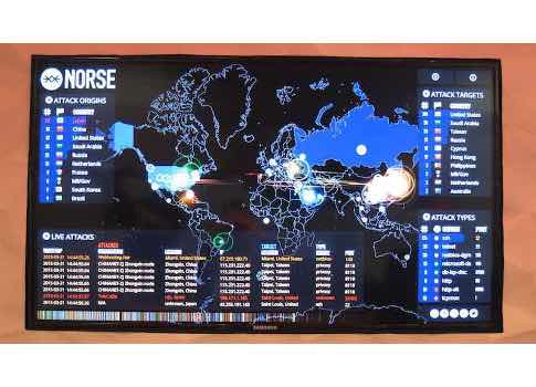 Real-time monitoring of cyber attacks from around the world. This monitor displays where the attacks originate and intended targets. The U.S. is constantly bombarded with attacks. Courtesy: Eric R. Eissler