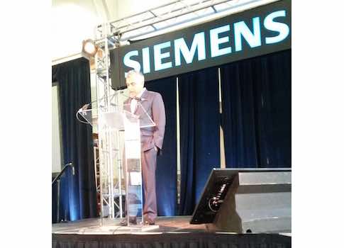 Raj Batra, president of Digital Factories for Siemens USA, speaks at the Siemens’ Oil and Gas Innovations Conference, encouraging use of automation to add reliability, visibility, and efficiency. Courtesy: CFE Media, Eric R. Eissler