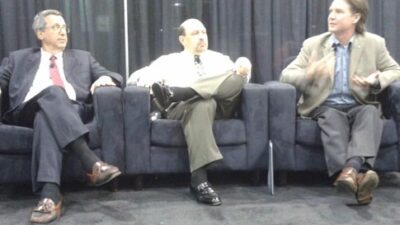 From left, Jacob Goodwin, director of membership at the Digital Manufacturing and Design Institute (DMDII), Mark Besser, a Smart Manufacturing Leadership Coalition (SMLC) board member and an SMLC technology advisory committee member, Mike Yost, president,