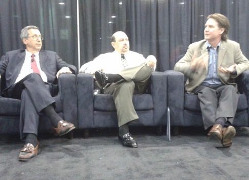From left, Jacob Goodwin, director of membership at the Digital Manufacturing and Design Institute (DMDII), Mark Besser, a Smart Manufacturing Leadership Coalition (SMLC) board member and an SMLC technology advisory committee member, Mike Yost, president,