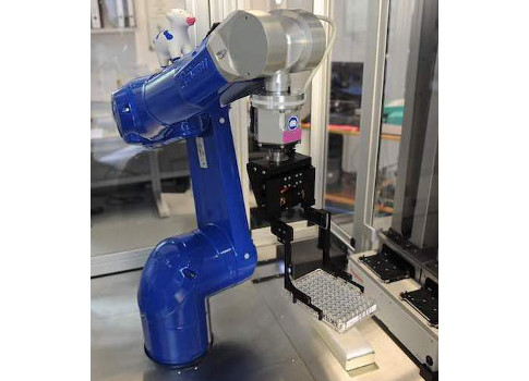 Figure 3: Six-axis robot handles thousands of samples a day, transferring microtiter plates between lab stations with speed and accuracy. Courtesy: Stäubli, RIA