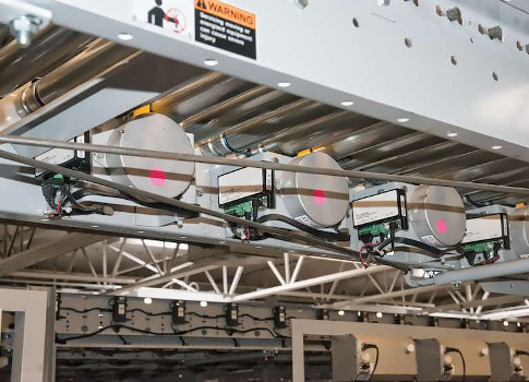 Figure 1: DC motors work well in low cost, low speed or constant-torque applications such as on this belt-driven roller conveyor. Courtesy: AutomationDirect