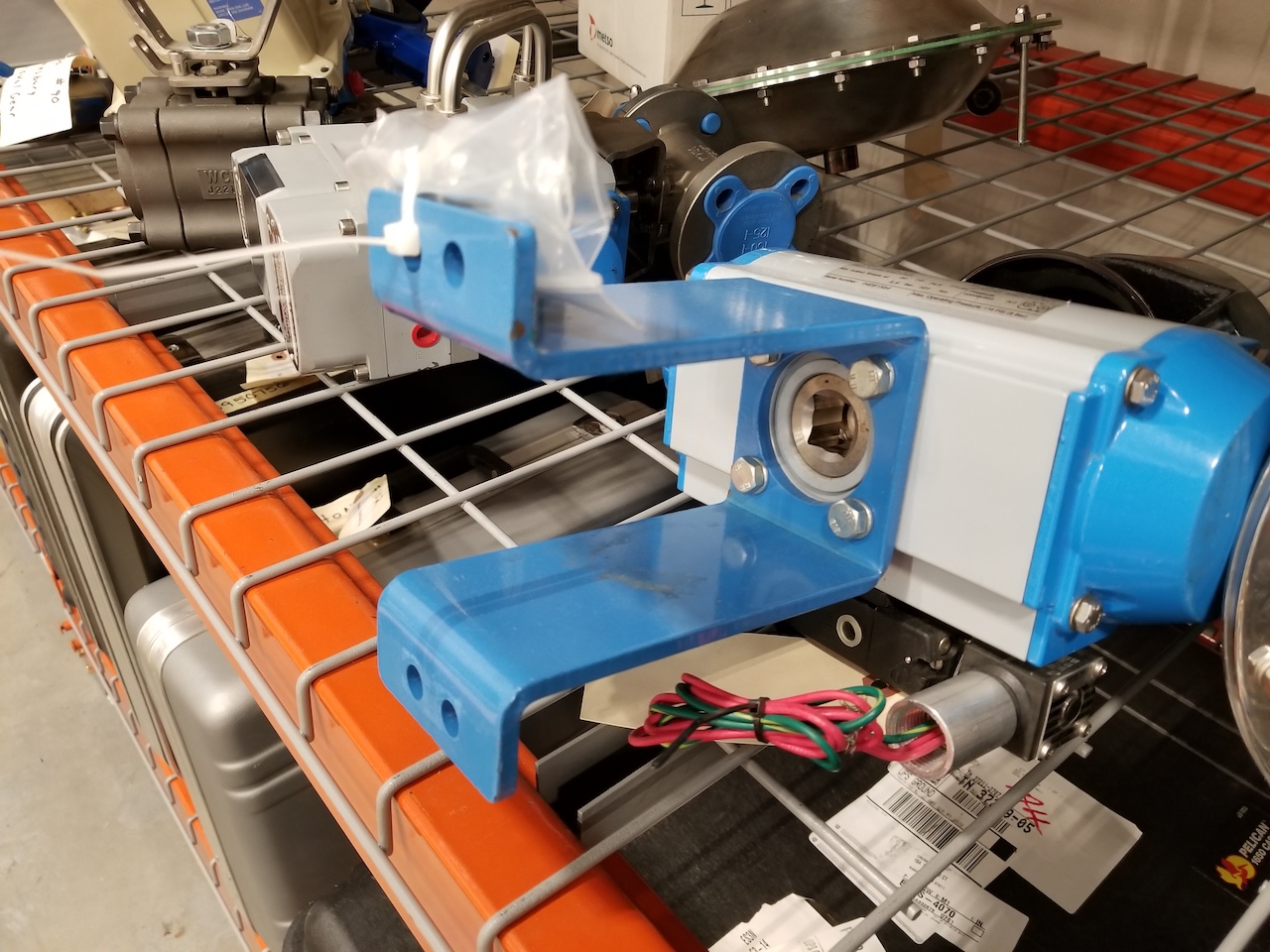 Figure 3: An actuator with a valve mounting bracket is shown. There are custom bracket manufacturers that will adapt most actuators to most valves. Courtesy: Cross Co.