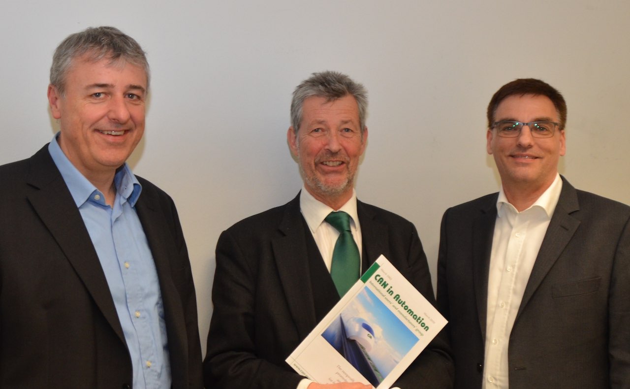 From left to right: Christian Schlegel (HMS), Holger Zeltwanger, and Uwe Koppe (Microcontrol), were re-elected to CAN in Automation's board for 2019. Courtesy: CAN in Automation