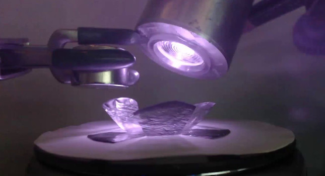 Rotation of a "flower" with six petals. Turning on the LED in sync with the rotation of every second petal beneath the magnet causes lifting of alternating petals, which remain lifted. Courtesy: Jessica A.-C. Liu, NC State University