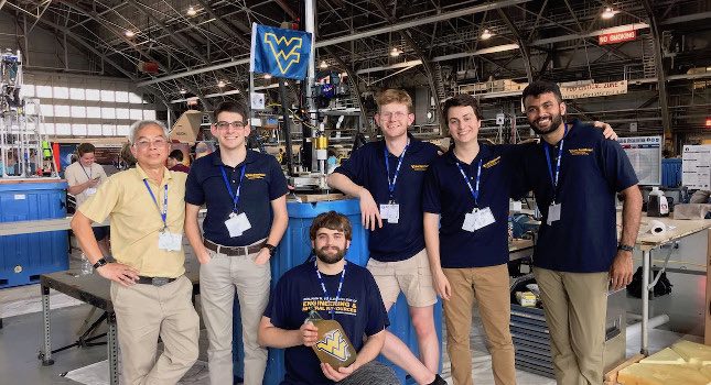 WVU Professor Powsiri Klinkhachorn, Derek Roesch, Bertrand Wieliczko Ian Hostottle, Nathan Owen and Karan (Kermit) Sah make up the MIDAS III team. Courtesy: West Virginia University