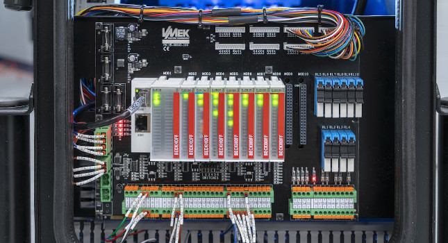 The compact Beckhoff Automation EtherCAT EJ boards reduce footprint on VMek hardware. Standard LED lights, which can be seen through a window on the Metrix and Element machines, provide EtherCAT diagnostic information for operators. VMek sorting machines include the Metrix Analytic Lab Color Sorter and Element Analytic Production Color Sorter. Courtesy: Kevin Blackburn