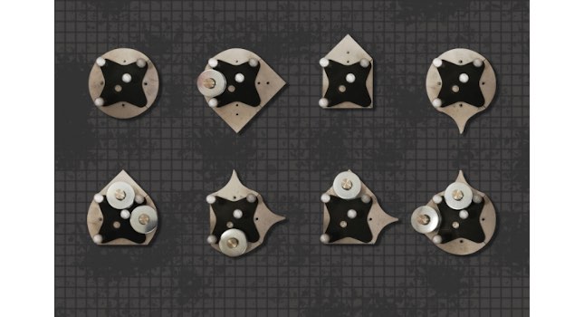 A key to compiling the novel Omnipush dataset was building modular objects (pictured) that enabled the robotic system to capture a vast diversity of pushing behavior. The central pieces contain markers on their centers and points so a motion-detection system can detect their position within a millimeter. Courtesy: Massachusetts Institute of Technology (MIT)