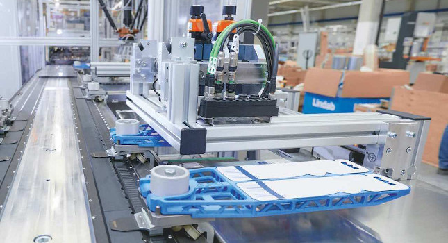 A total of 24 movers with light, 3D-printed blister grabbers travel along an 11-meter-long XTS circuit between one HSPP system, the laser labeling system and the second HSPP. Courtesy: Beckhoff Automation