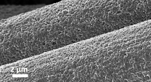 This magnified image shows aluminum deposited on carbon fibers in a battery electrode. The chemical bond makes the electrode thicker and its kinetics faster, resulting in a rechargeable battery that is safer, less expensive and more sustainable than lithium-ion batteries. Courtesy: Cornell University