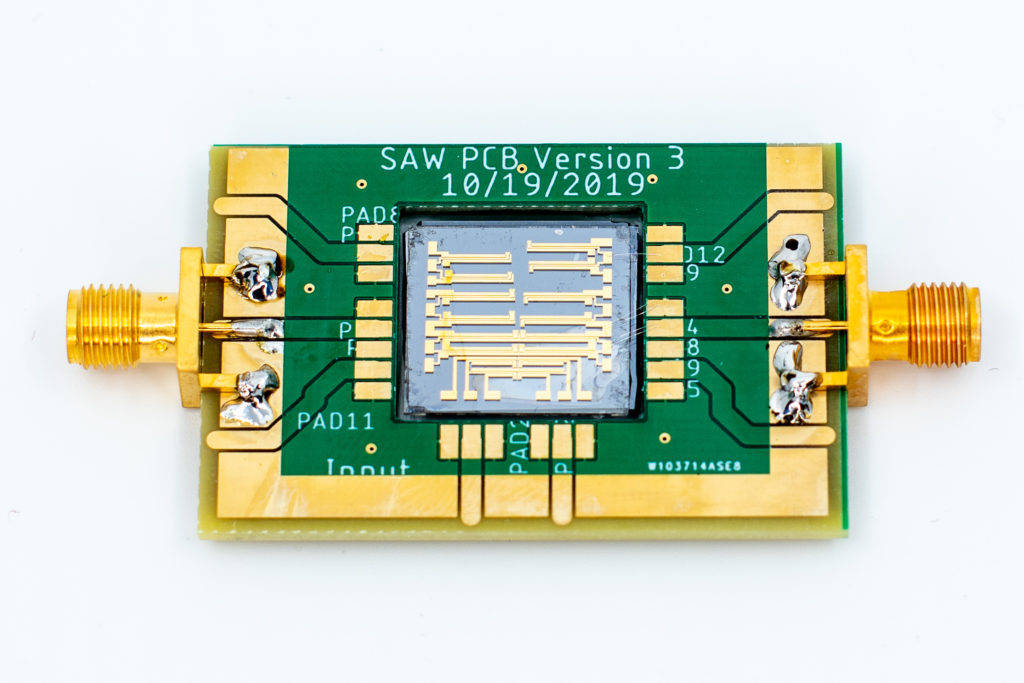This chip can move excitons with acoustic waves. The achievement paves the way for building efficient devices that use excitons for applications in data communication and processing, sensing and energy conversion. Courtesy: Silvia Cardarelli, University of Michigan