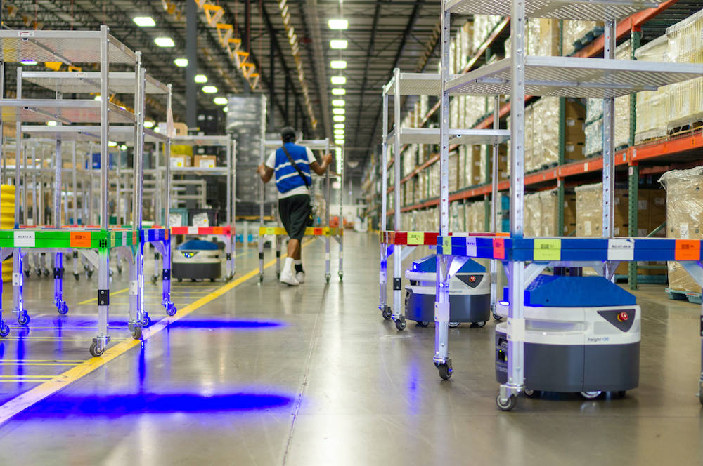Fetch's CartConnect AMRs are designed to work alongside people, forklifts, and other material handling equipment within busy warehouse environments. Courtesy: A3/Fetch Robotics