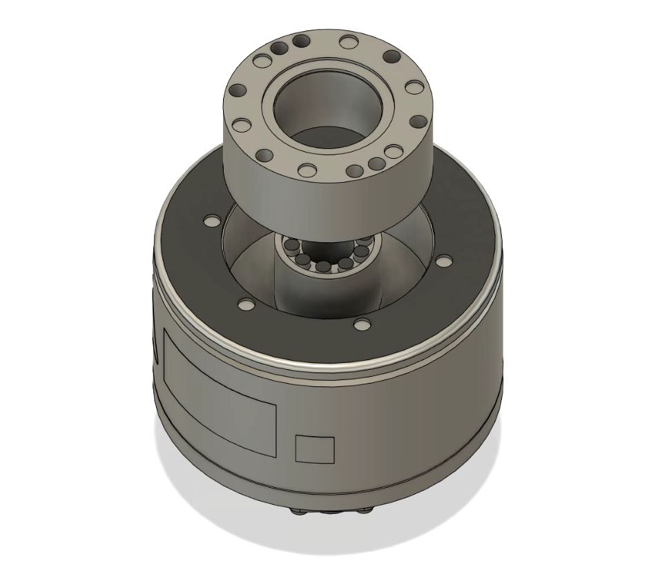 Figure 4: Like a standard servomotor, the rotor of a direct-drive motor is built from an iron structure with an assembly of permanent magnets. The coils in the stator produce a moving magnetic field which applies torque in the desired direction. Position feedback to the control system is provided through a rotary encoder. Courtesy: Yaskawa America Inc.