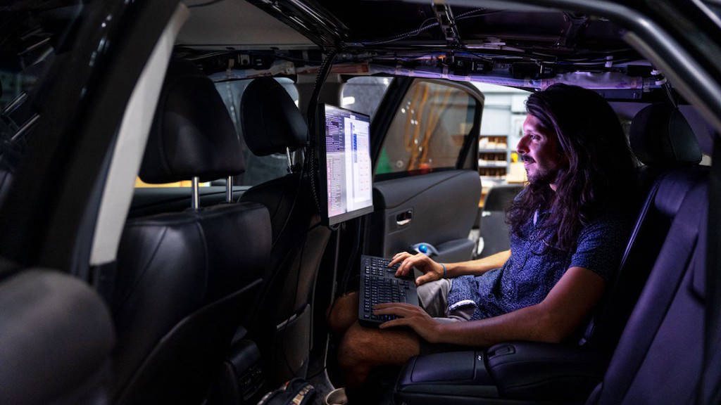 Carlos Diaz-Ruiz, a doctoral student, drives the data collection car and demonstrates some of the data collection techniques the autonomous vehicle researchers use to create their algorithms. Courtesy: Ryan Young, Cornell University