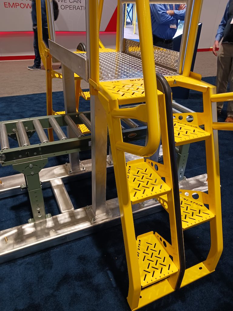 If a conveyor is preventing access to someplace someone needs to be, a compact, alternating-tread stair design can fit over a conveyor, providing a mobile, lower-risk alternative to ladders. Courtesy: Mark T. Hoske, Control Engineering, CFE Media and Technology