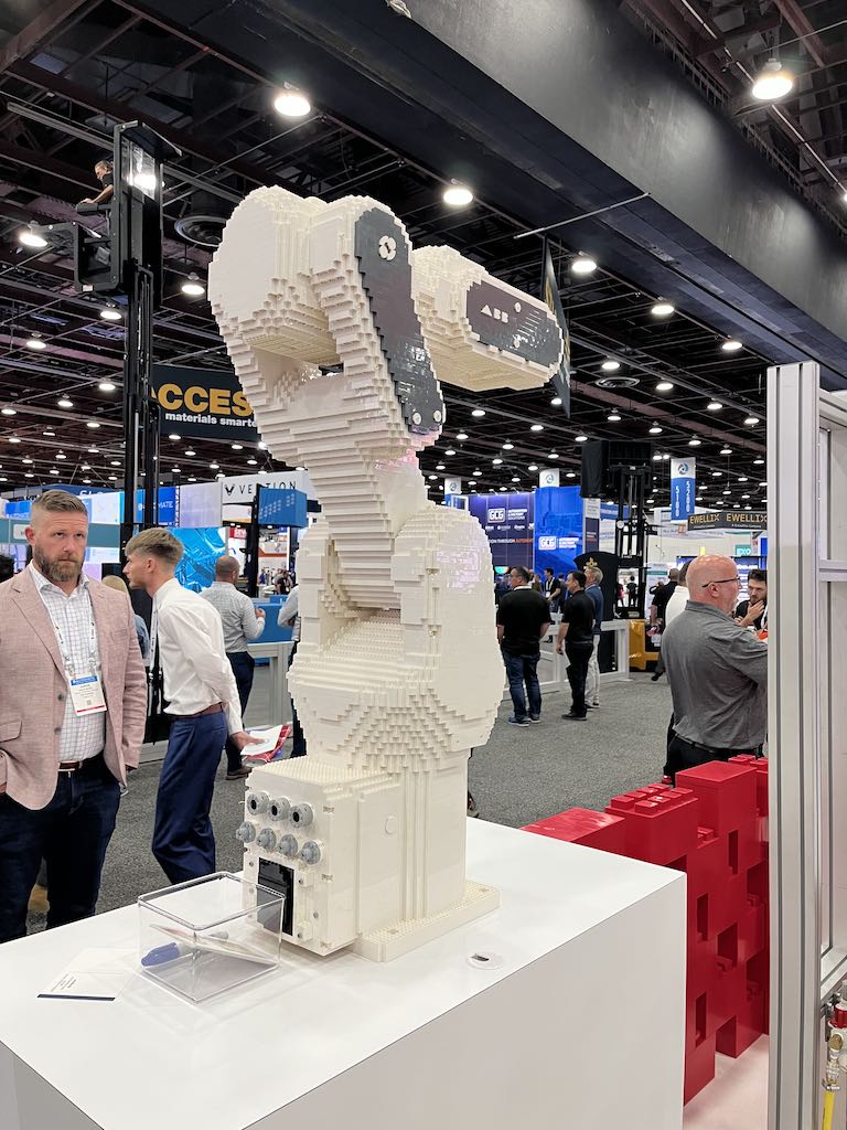 Jessica Ragzy Ewud, a contemporary artist and LEGO master, built a full-size LEGO replica of the ABB CRB 1300 Swifti collaborative robot at the ABB booth with some help from the Swifti and an ABB Flex Feeder robot. Courtesy: Chris Vavra, CFE Media and Technology