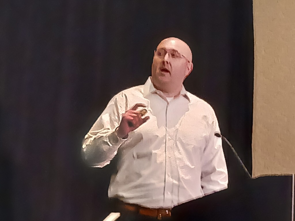 Figure 3: Dave Hedge technology architect, IT Fellow, ExxonMobil Technology and Engineering, discussed how to bring IT technology to the OT space. Transitions requires changes at the 2024 ARC Industry Forum. 