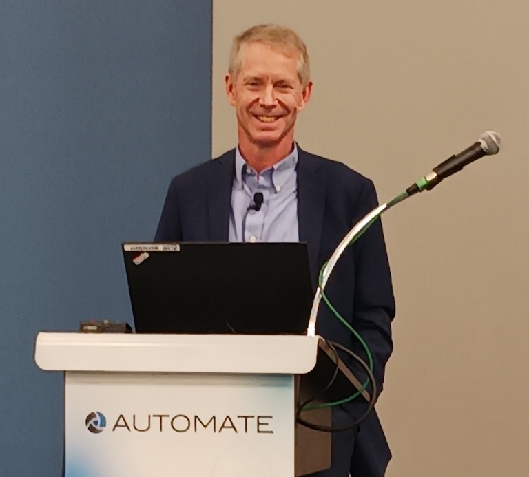 Figure 1: Patrick Varley, product marketing manager (mechatronics), Mitsubishi Electric Automation Inc. Varley spoke at Automate 2024 by A3, the Association for Advancing Automation, in Chicago, during the session, “How their first robot purchase enables a 70-year-old company with 11 facilities on 3 continents to profitably expand their domestic manufacturing.” Varley explained how Worldwide Fittings Inc. increased utilization rate from 70% to 90% or more with a machine tending robot, its first, with an expected return on investment of less than 24 months. 