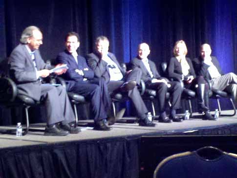 The panel from left to right: host, Andy Chatha, ARC Advisory Group; Helmuth Ludwig of Siemens Industry; Andreas Wernsdörfer of BASF; John Berra of Emerson Process Management; Carrie Schaller of Dow Chemical; and Kirk Goins of Comau Body Welding.