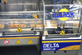 Figure 1: Typically, safe machines, such as this flow wrapping machine, which protects workers from moving parts with covers secured by safety switches, should not have to stop for corrective action during scheduled production. Courtesy: ILAPAK Inc.