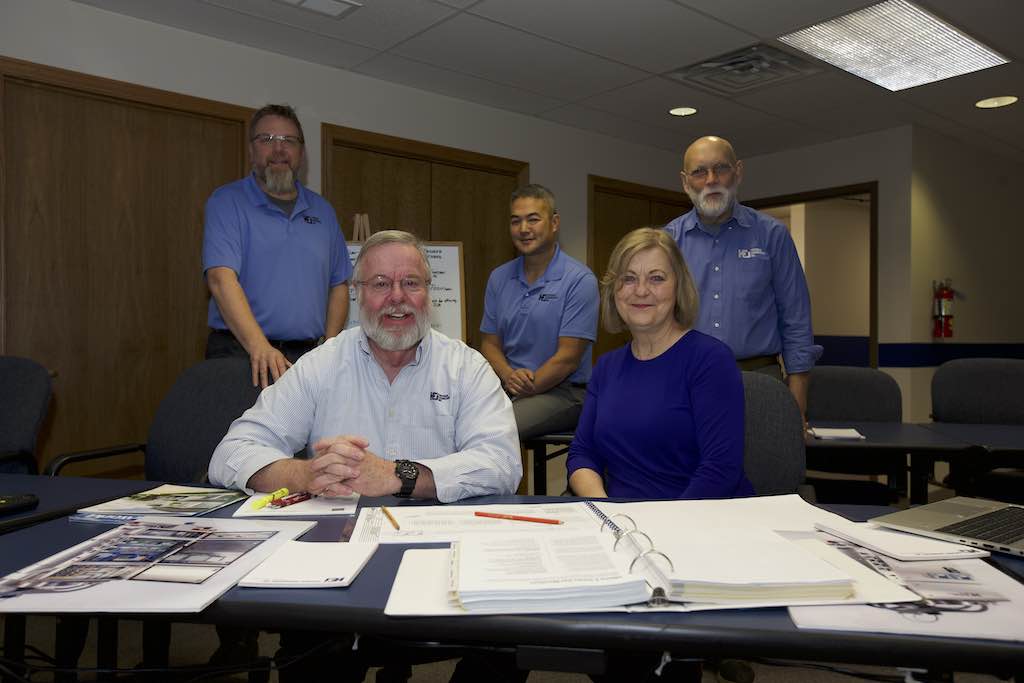 Left to right: Toby Varner, Howard Huffman, Keith Mandachit, Wendy Huffman, Bernie Lyons. Courtesy: Huffman Engineering