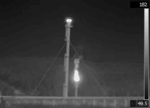 OGI cameras capture images of the normally-invisible methane and VOC emissions. Incomplete combustion (plume from the flare on the right) can be a large source of VOC leaks. Image courtesy: FLIR Systems