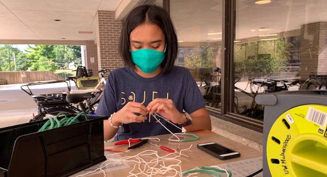 In early-fall 2020, College of Engineering student employees assembled Badger Seal mask fitters outside the Grainger Engineering Design Innovation Laboratory in Wendt Commons. Courtesy Renee Meiller, University of Wisconsin-Madison