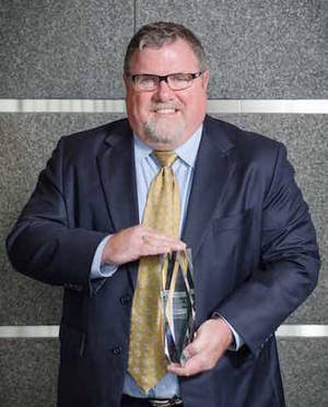 Representing the 2015 System Integrator of the Year in the large system integrator category is Paul Galeski, President and CEO of MAVERICK Technologies. Courtesy: CFE Media