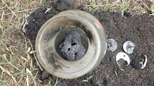 Boiler flask showing the vug or shell formed by vaporized zinc. Courtesy: Linden Duncan