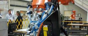 A robot is a moving, functional container of integrated systems with sensors, logic, and actuation, usually integrated with a larger production environment. This one was at ABB Robotics Technology Day 2013, in May. Courtesy: CFE Media, Mark T. Hoske