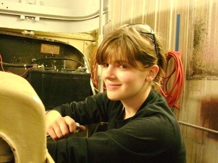 Alyssa Hartman working on the robot truck, new 4-H Robot Club president