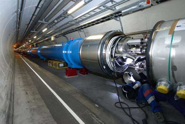 CERN technician connects superconducting magnets in the Large Hadron Collider (LHC) tunnel. Analog Devices' processing technology helps CERN’s LHC achieve the highest possible superconducting magnet performance. CERN photo