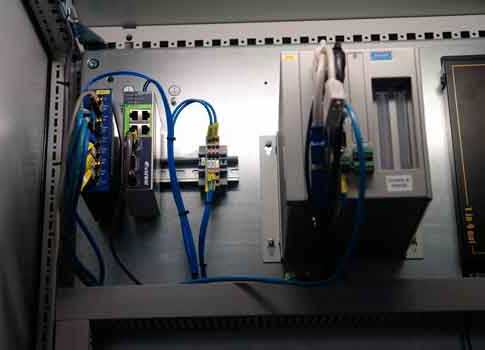 An eWON industrial VPN router combines a modem, an IP router, drivers for serial and Ethernet PLC protocols, and a processor for autonomous management of communication tasks. It offers additional services for PLC parameters. Courtesy: River Heights Consu