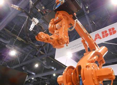 ABB Robotics combined its IRB 660 and IRB 140 robots, creating an IRB 800 robot with 10 axes of movement for robotic welding and other highly nimble applications. The black mounting plate at the top of the photo is where the two robots connect. Courtesy: