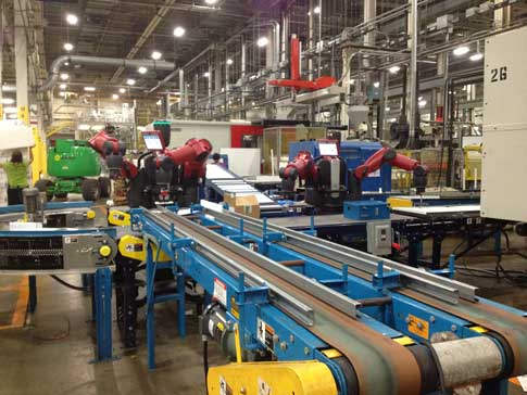 Baxter on the job kitting parts at a plastics manufacturing facility. Courtesy: Rethink Robotics