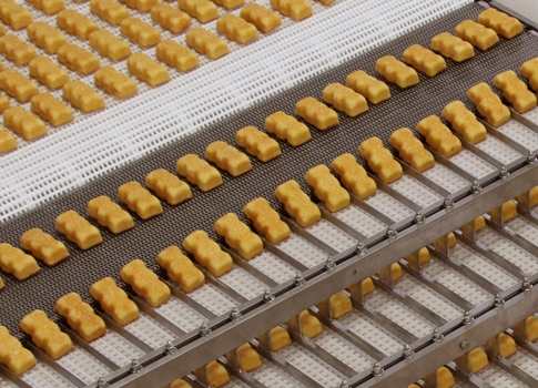 Snack cake and snack pie machines include safety features aimed at preventing employee injury, saving product materials, and avoiding catastrophic breakdowns, in addition to producing snack cakes at up to 1000 cakes per minute, and snack pies at up to 30,
