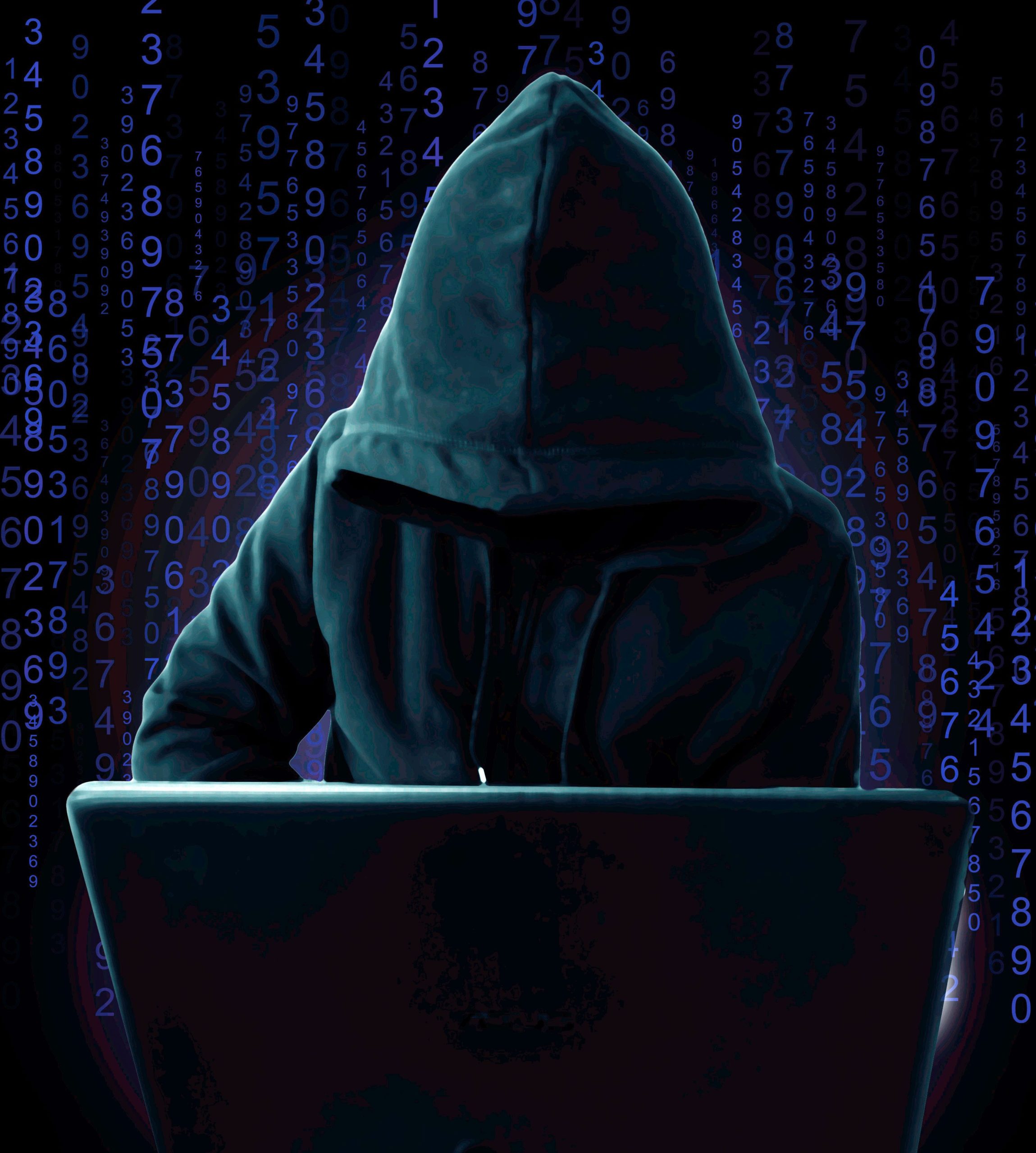 A hacker in the background.