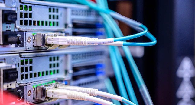 Image contains wires plugged into a digital device.Image courtesy: Brett Sayles